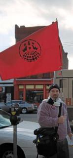 d2_iww_flag_at_protest.jpgmid